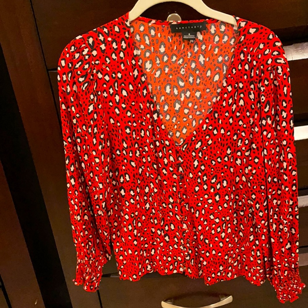 Tiger print red whit and black beautiful and feminine this is a staple brand new